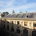 Modern Apartment With View On Paris Roofs